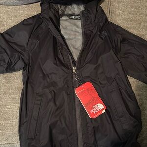 Brand new boys small north face rain jacket